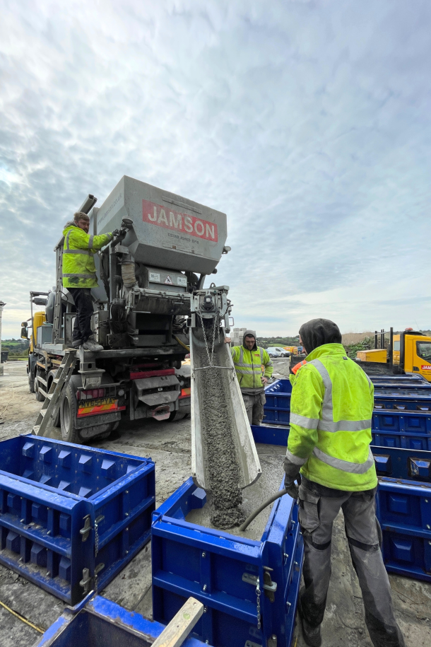 The production of interlocking concrete blocks on site in Ceredigion